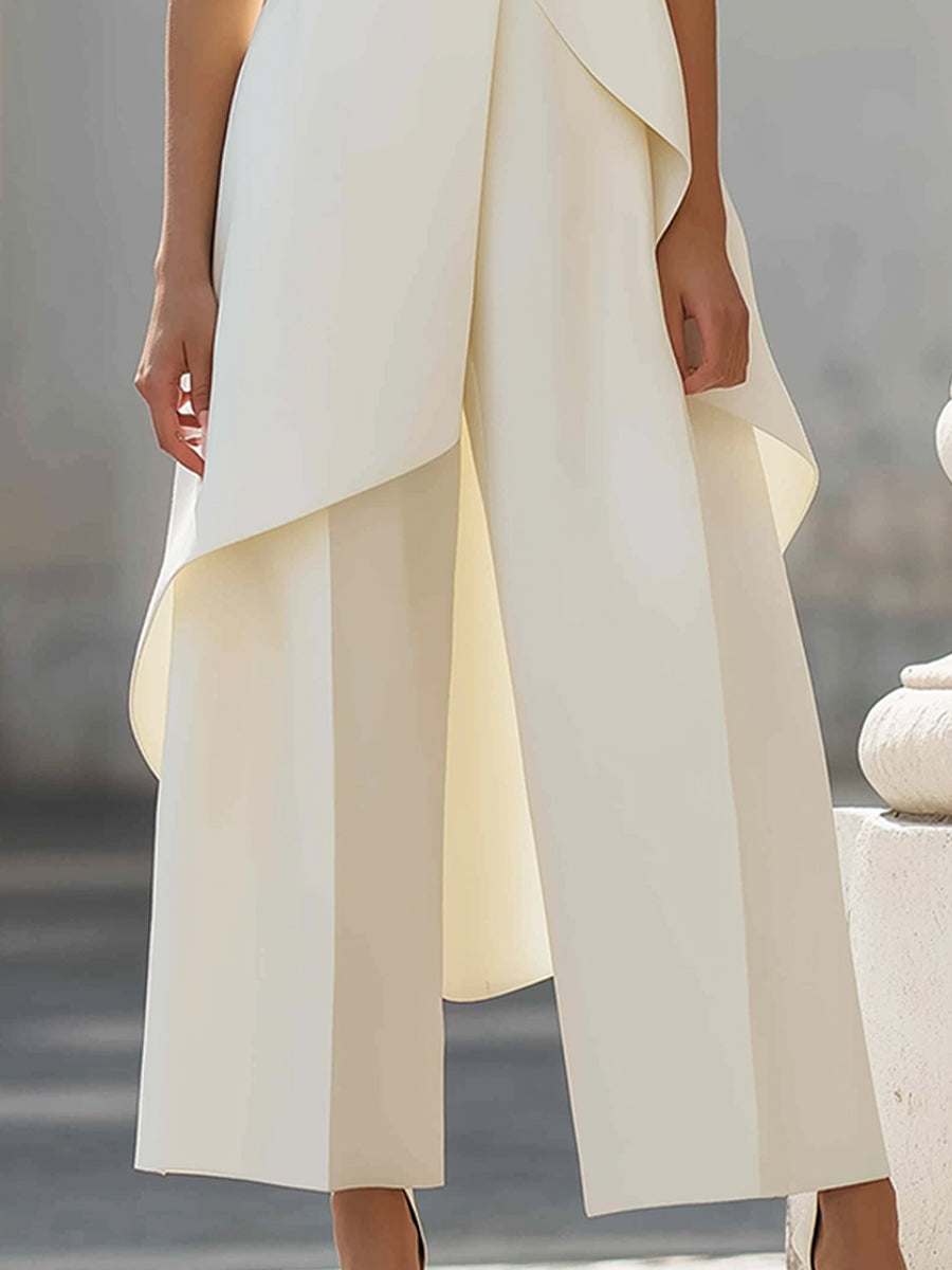 Mono de mujer con cuello alto, panel asimétrico y pantalón ancho