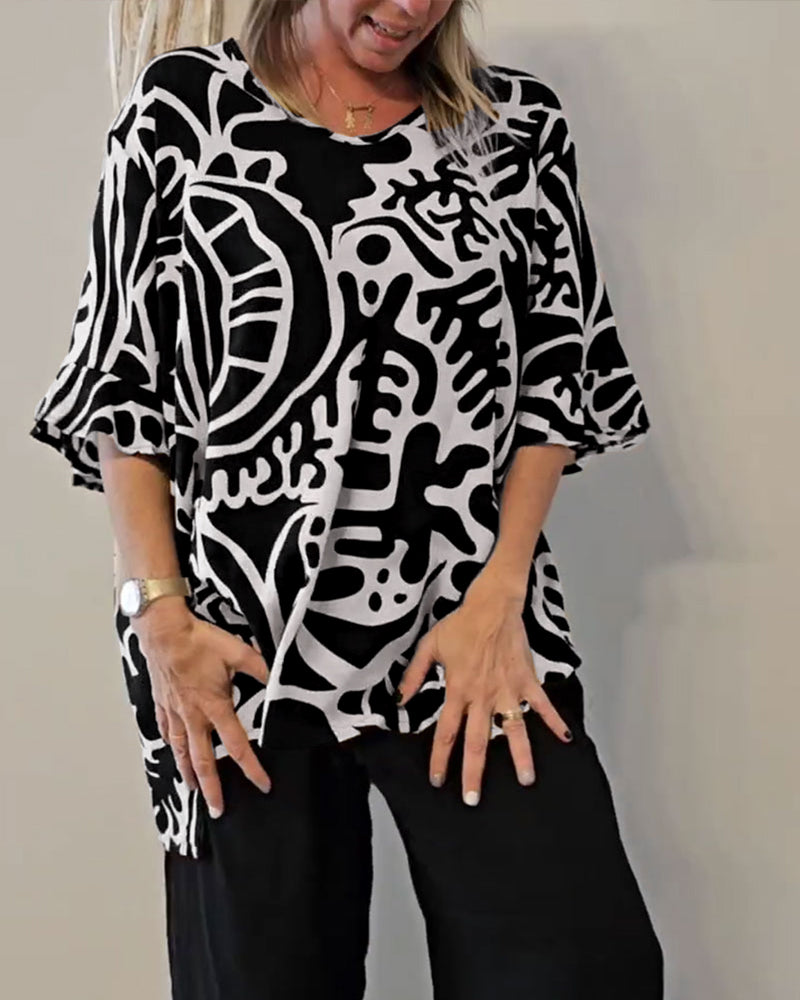Blusa amplia mujer con estampado abstracto y mangas fluidas
