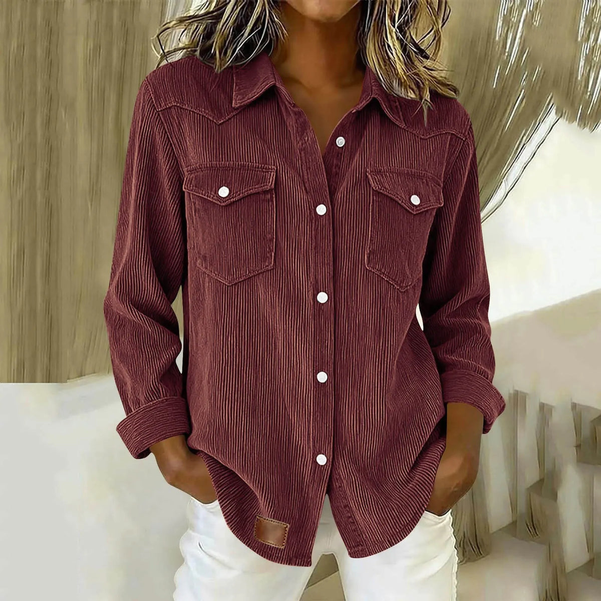 Camisa de mujer a rayas con botones y bolsillos