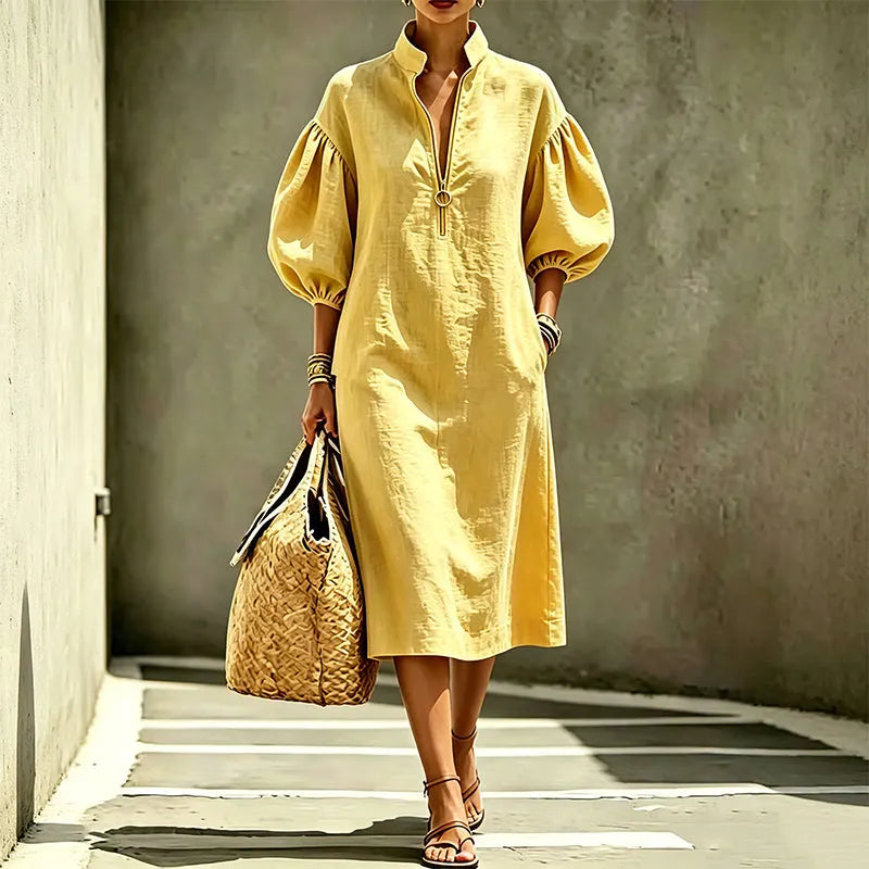 Vestido mujer fluido con mangas abullonadas y cremallera