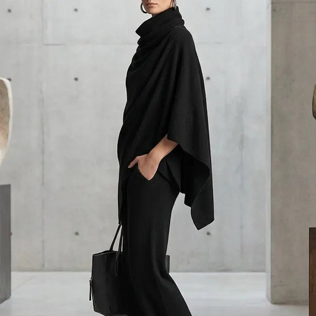 Conjunto elegante de capa drapeada y pantalón ancho para mujer