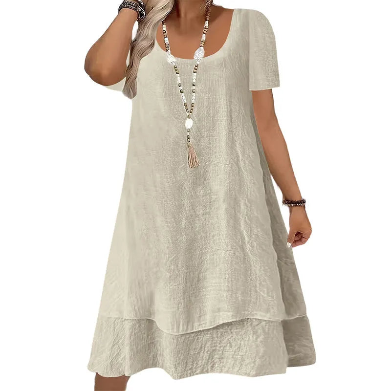 Vestido amplio de mujer con cuello redondo y mangas cortas