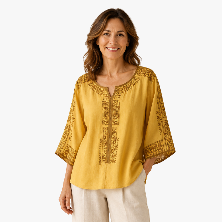 Blusa bordada de mujer con mangas tres cuartos y corte holgado