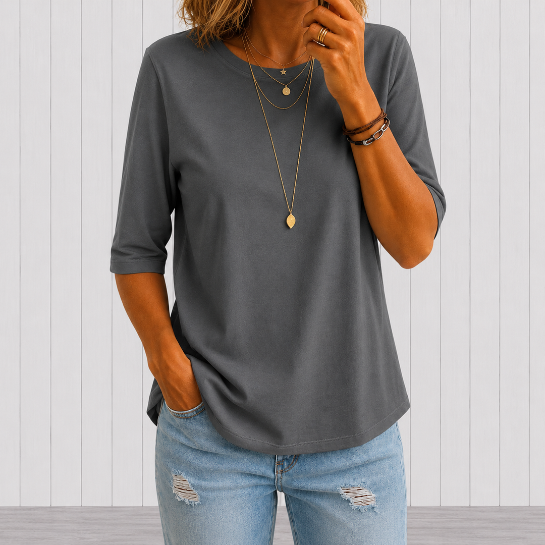Camiseta casual de mujer con cuello redondo y mangas tres cuartos