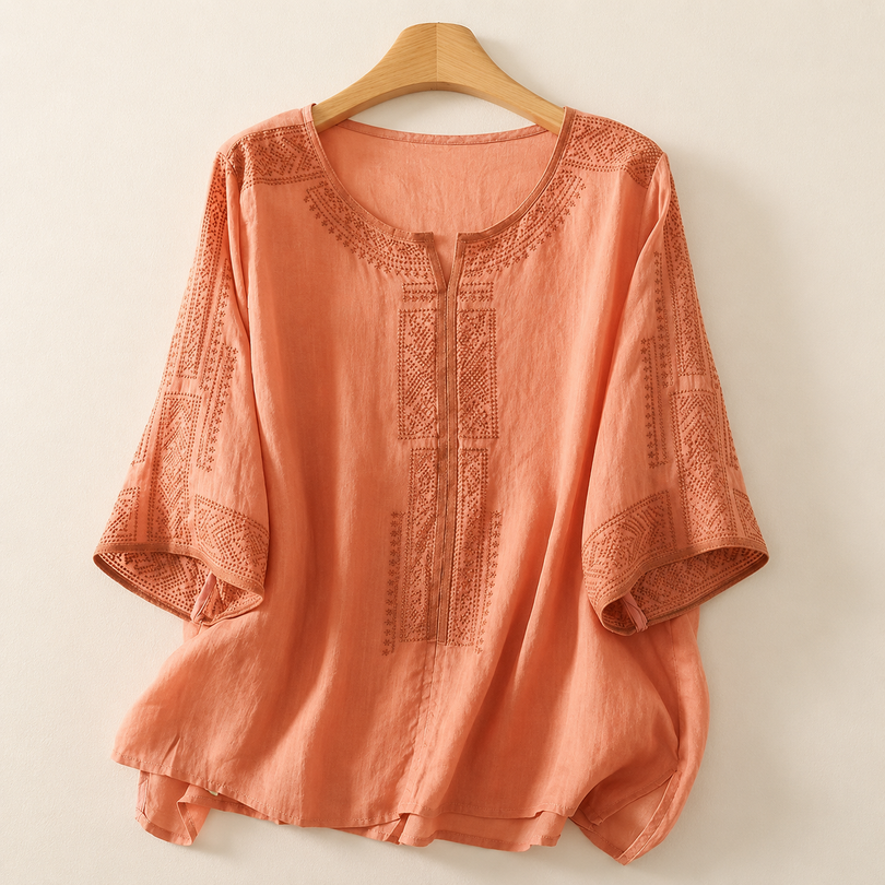 Blusa bordada de mujer con mangas tres cuartos y corte holgado