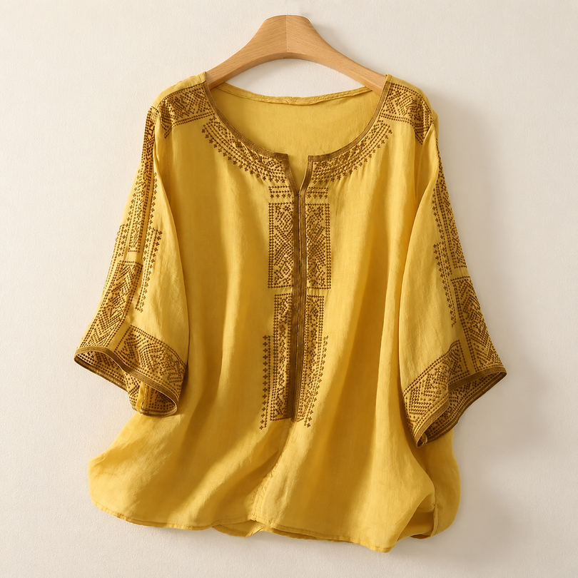 Blusa bordada de mujer con mangas tres cuartos y corte holgado