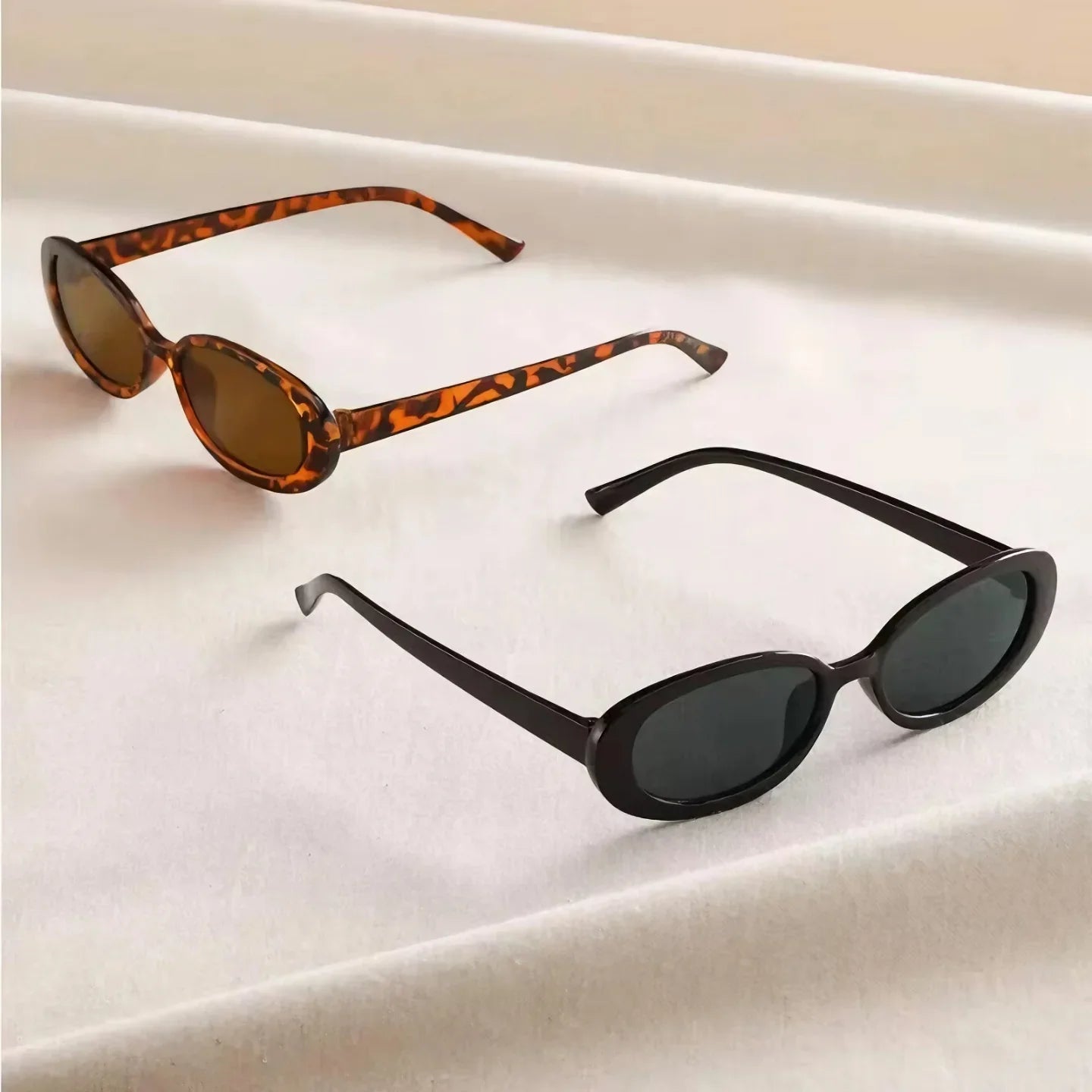 Gafas de sol retro ovaladas mujer – lentes negras UV400 estilo vintage