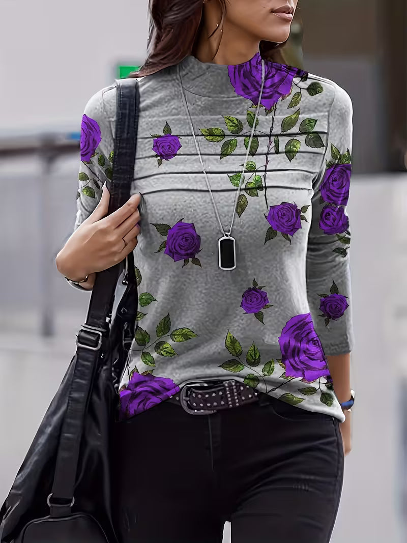 Blusa de mujer con estampado floral, cuello alto y mangas tres cuartos