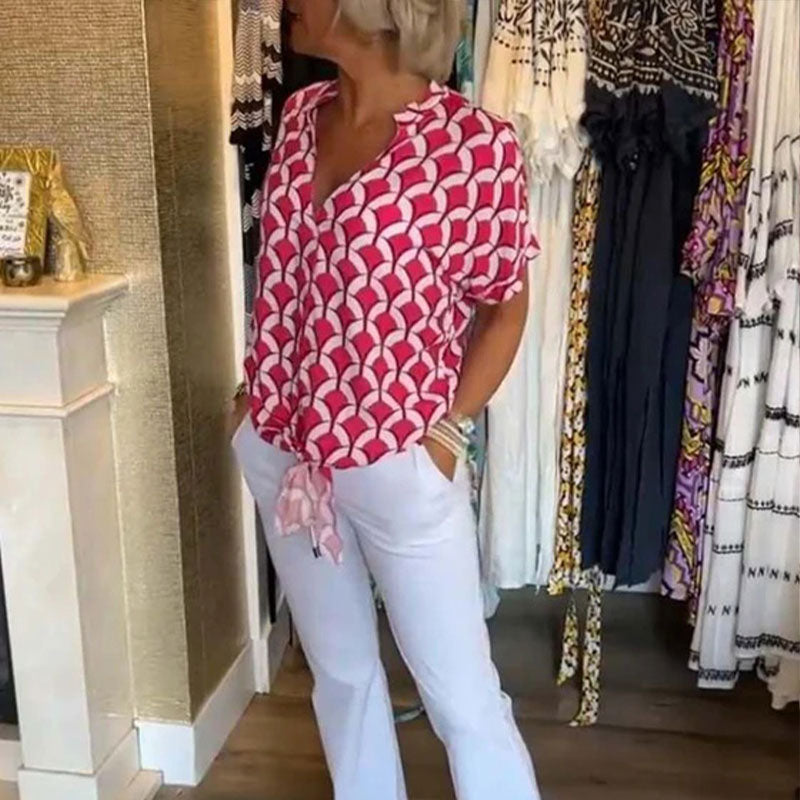 Blusa estampada mujer con cuello en V y mangas cortas