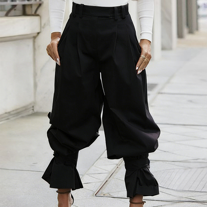 Pantalón plisado de mujer con puños acampanados elegantes