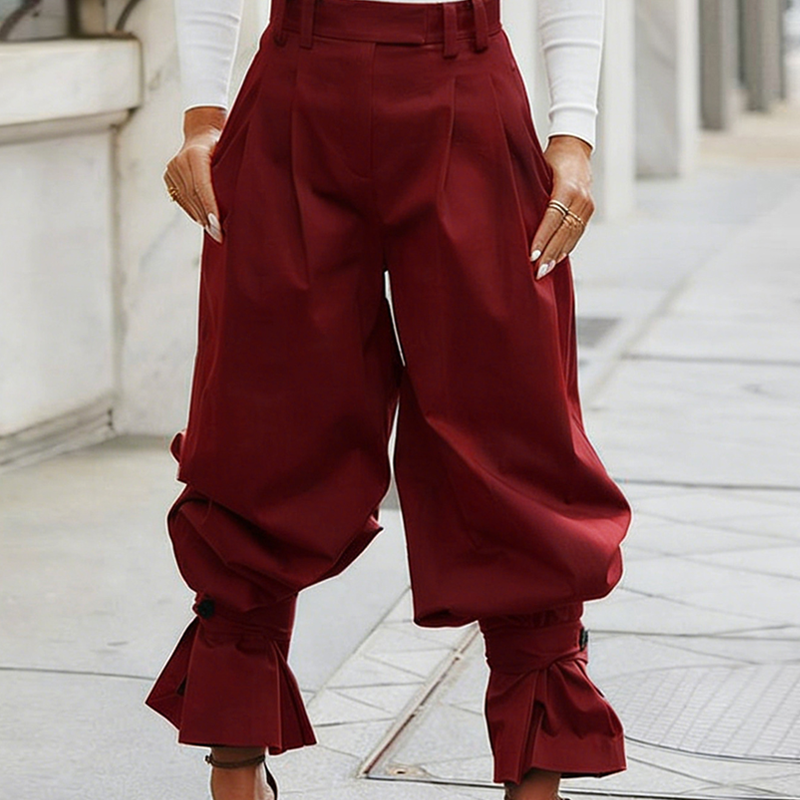 Pantalón plisado de mujer con puños acampanados elegantes