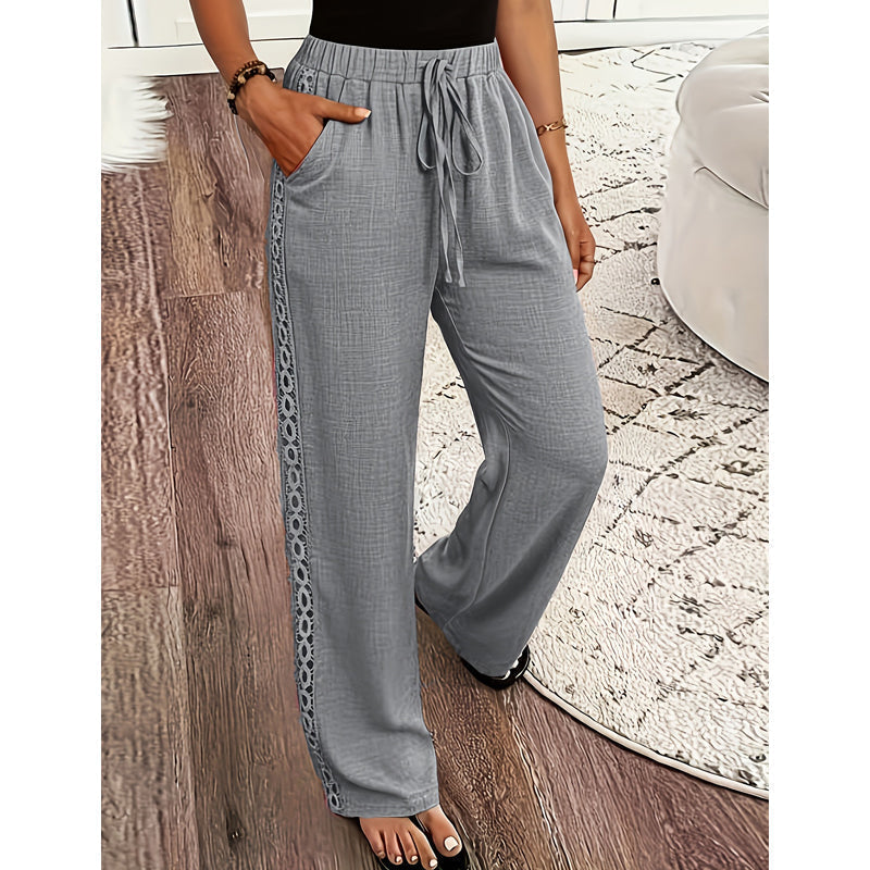 Pantalón mujer fluido con encaje lateral y cintura ajustable
