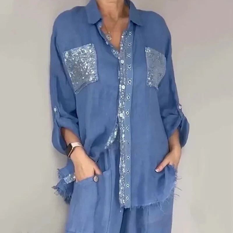 Conjunto de mujer con blusa fluida y pantalón con lentejuelas
