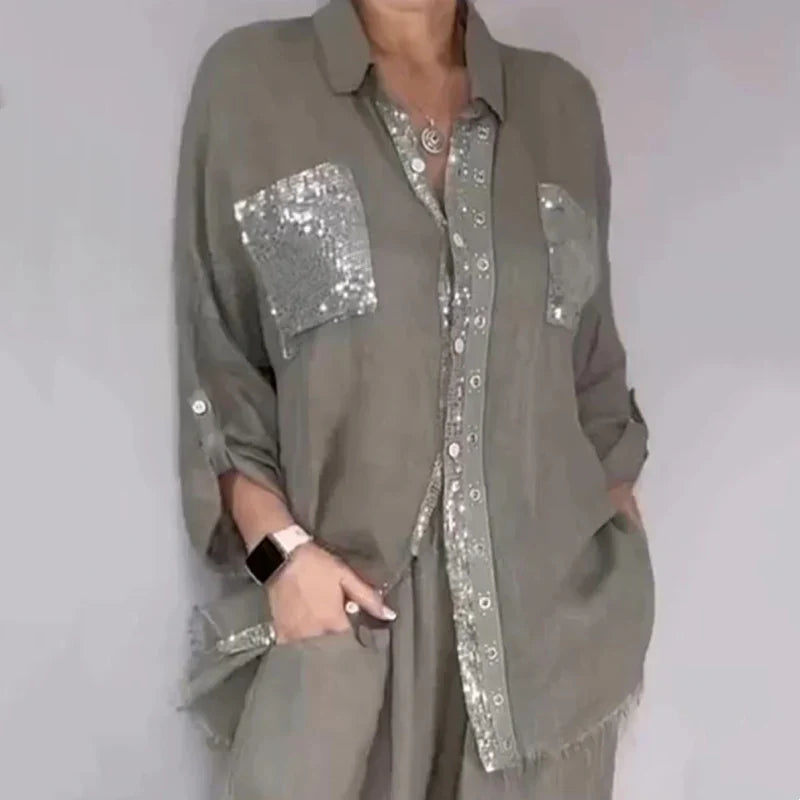 Conjunto de mujer con blusa fluida y pantalón con lentejuelas