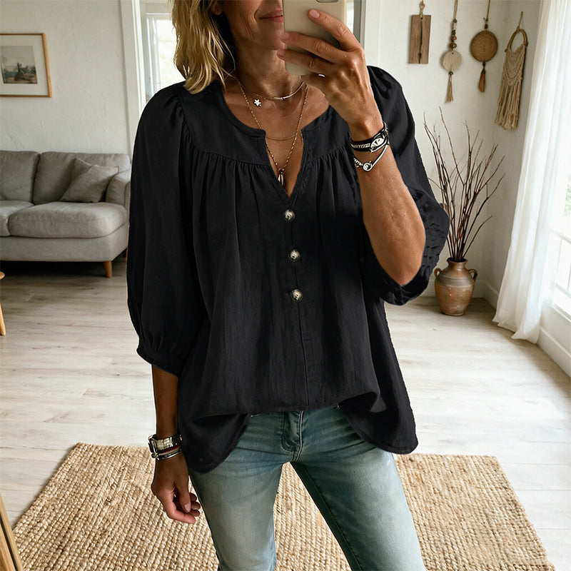 Blusa de mujer con escote en V, botones y mangas tres cuartos