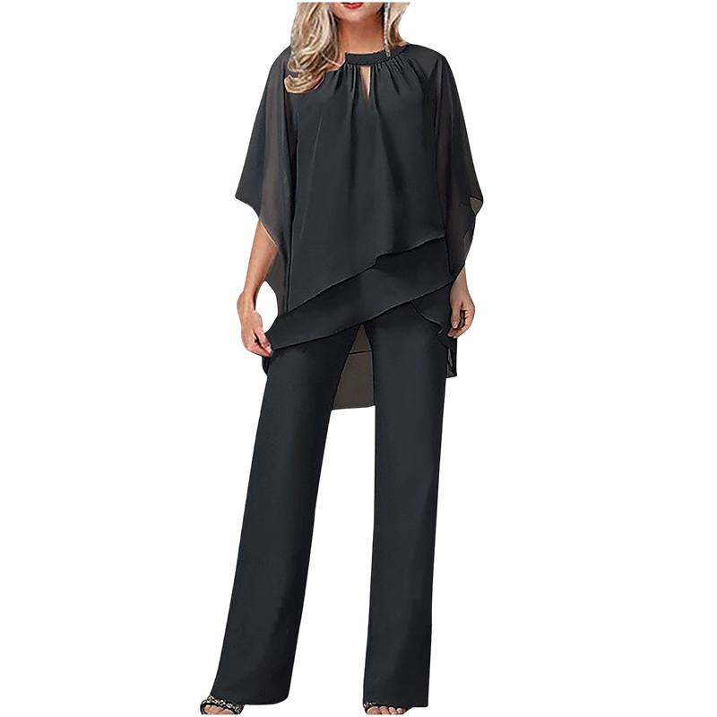 Conjunto elegante mujer con blusa asimétrica y pantalón ancho