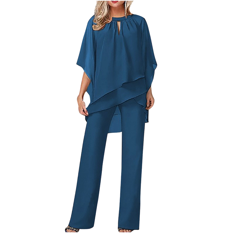 Conjunto elegante mujer con blusa asimétrica y pantalón ancho