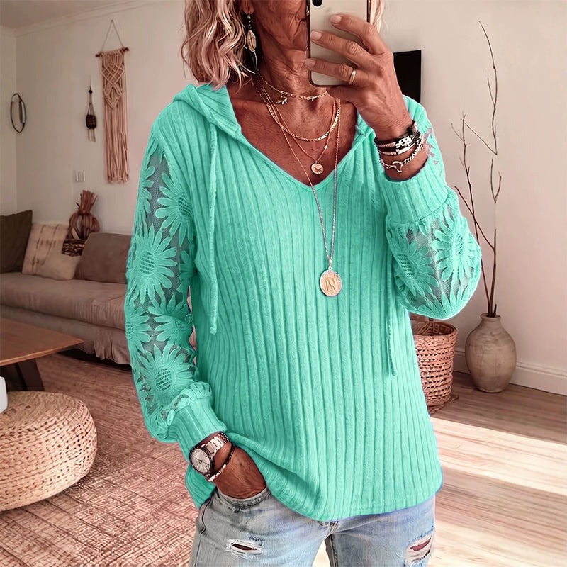 Top mujer con capucha y mangas de encaje floral