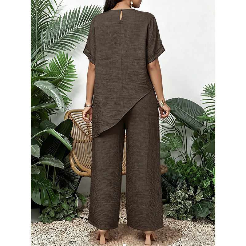 Conjunto de mujer con top asimétrico y pantalón de pernera ancha