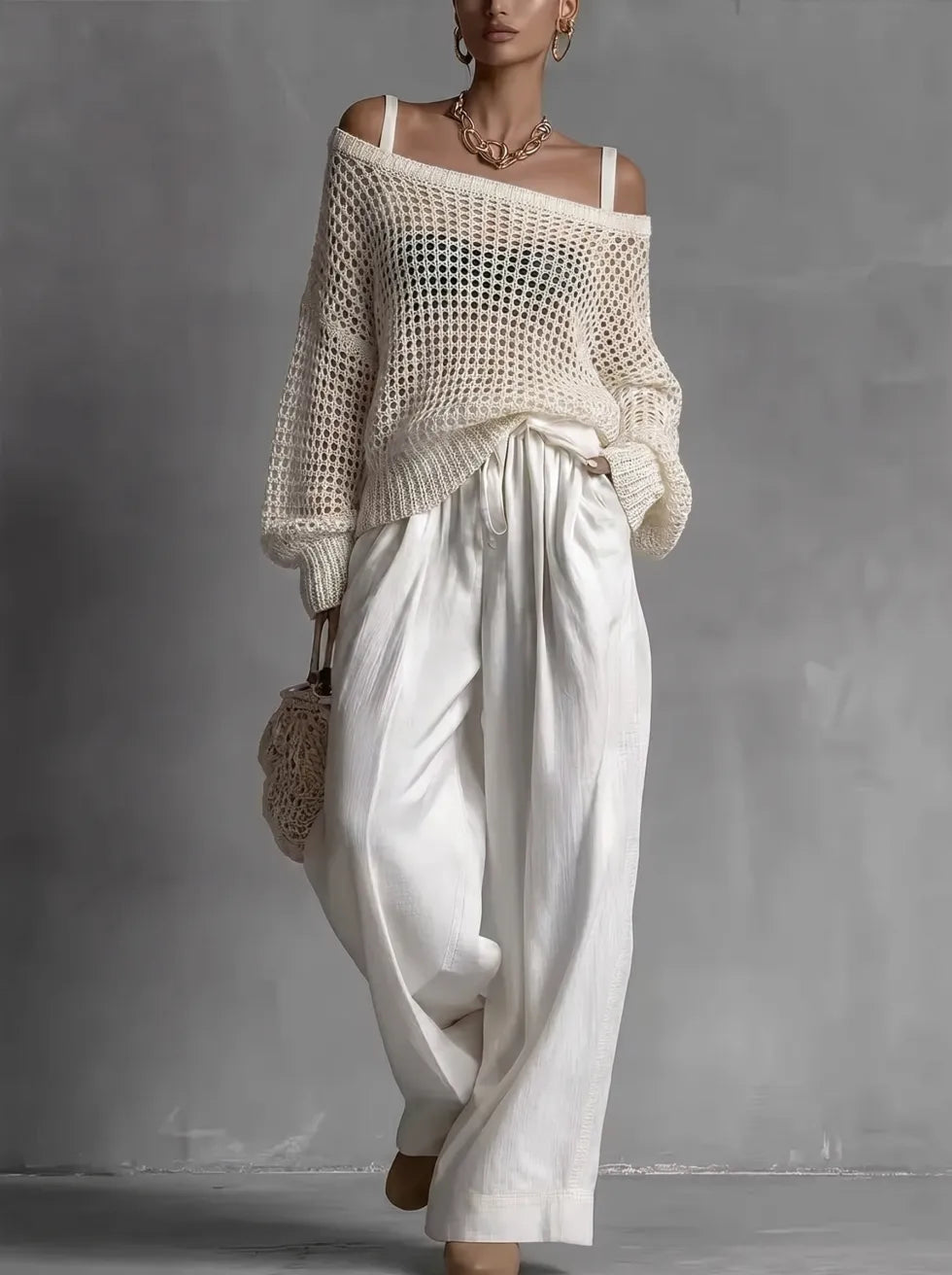 Conjunto de mujer con suéter calado y pantalón ancho