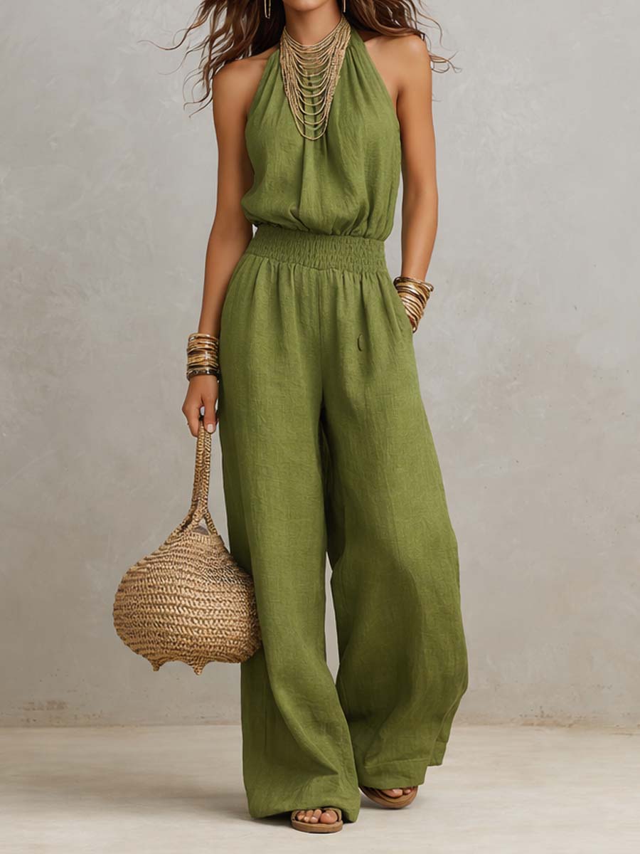 Mono mujer de espalda descubierta con escote halter y pierna ancha