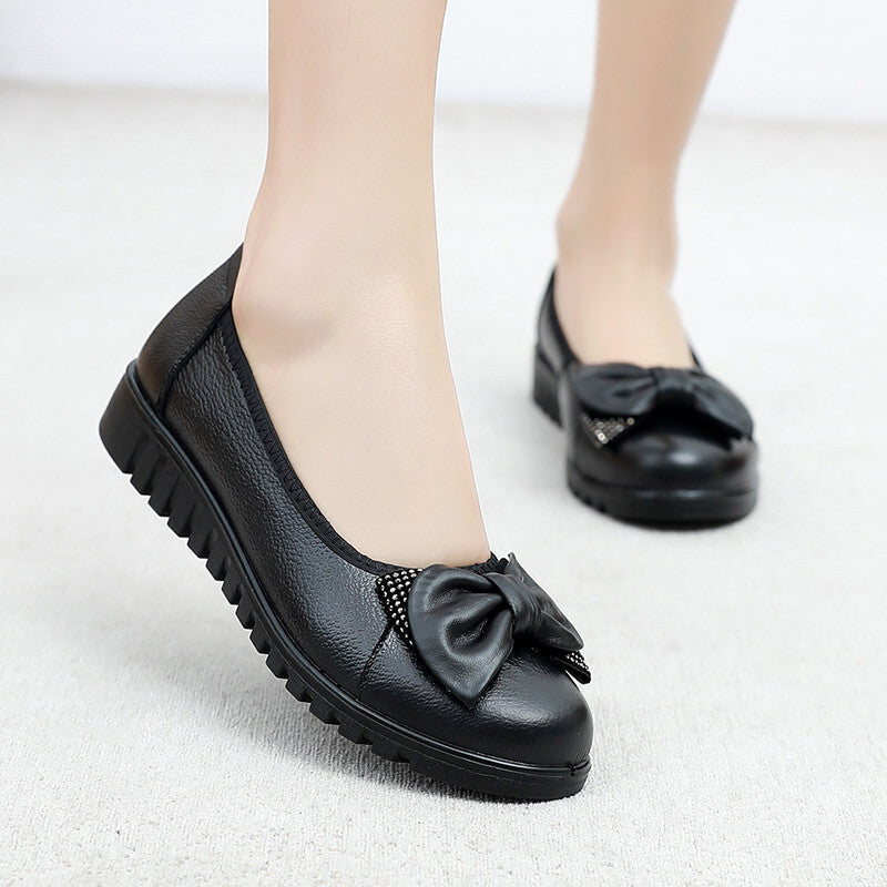 Zapatos slip-on para mujer con punta ancha y lazo decorativo