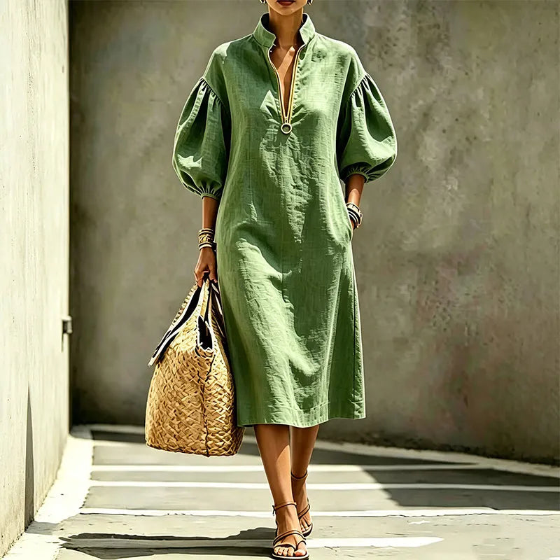 Vestido mujer fluido con mangas abullonadas y cremallera