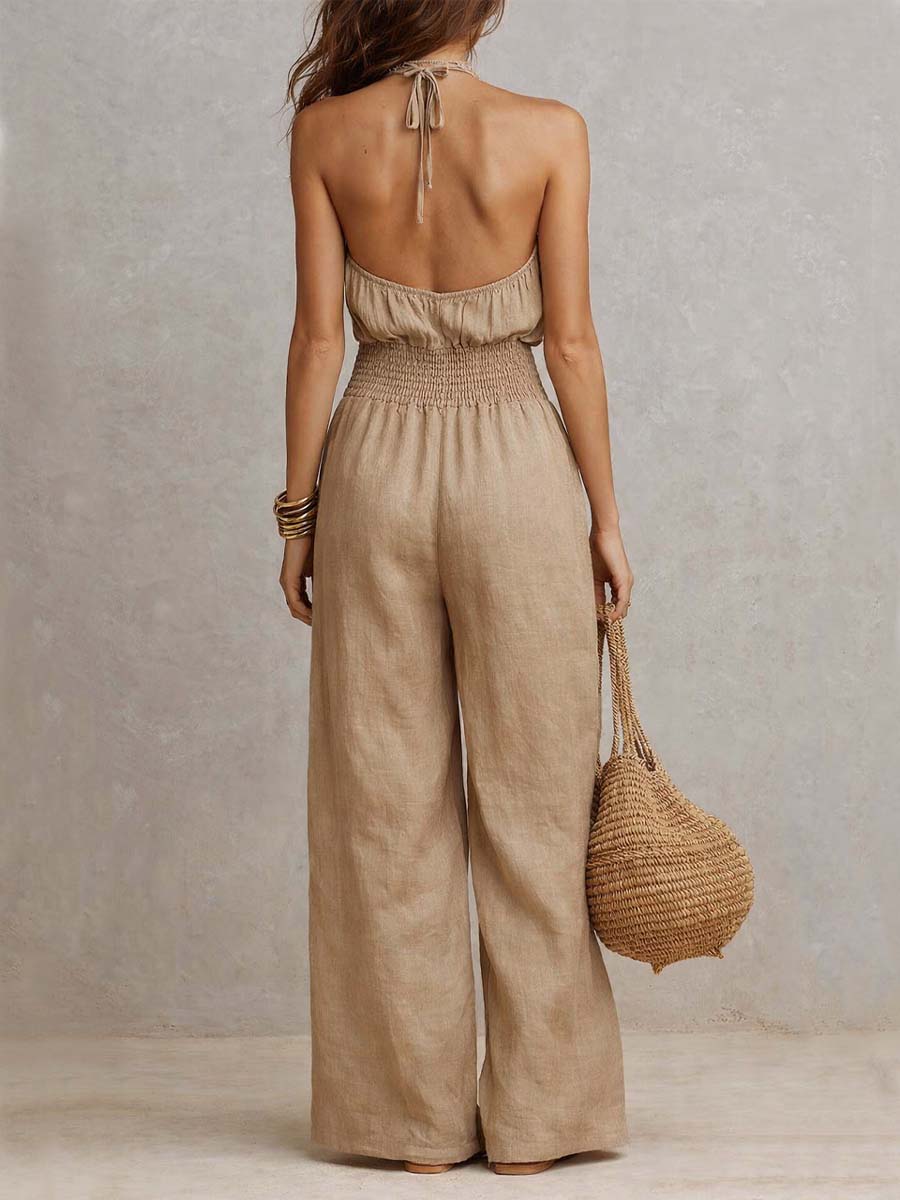 Mono mujer de espalda descubierta con escote halter y pierna ancha