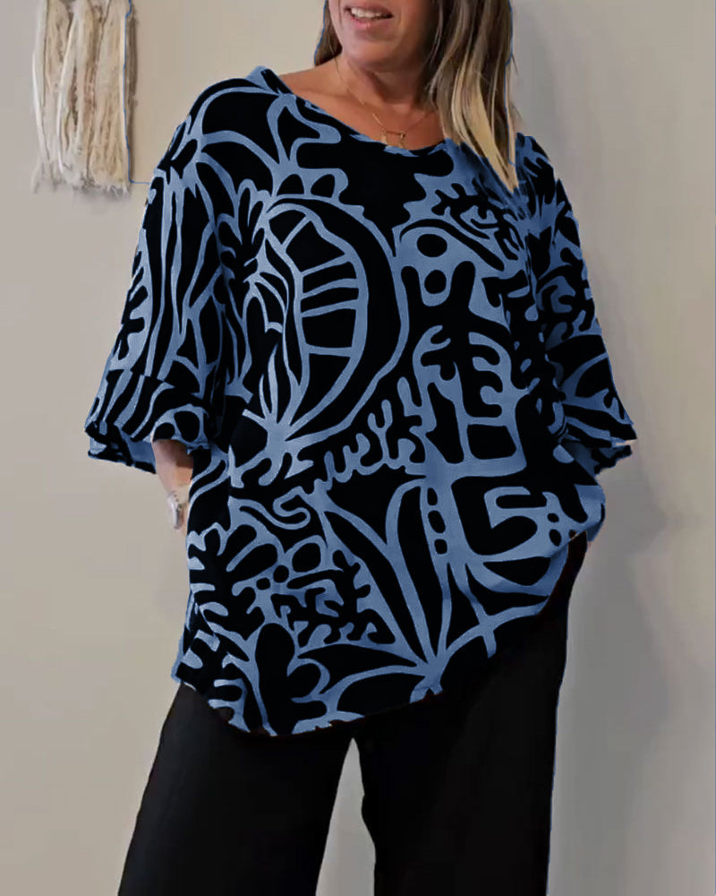 Blusa amplia mujer con estampado abstracto y mangas fluidas