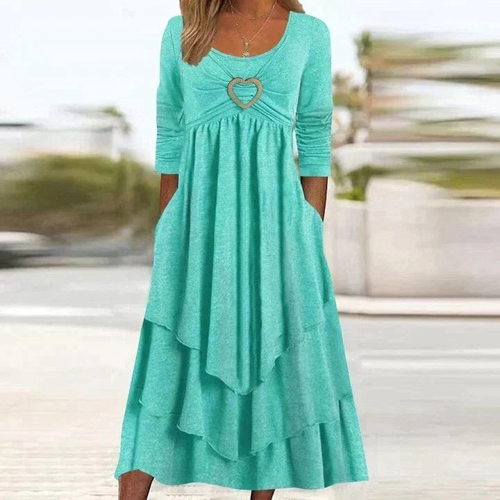 Vestido largo de mujer con detalle corazón y falda fluida