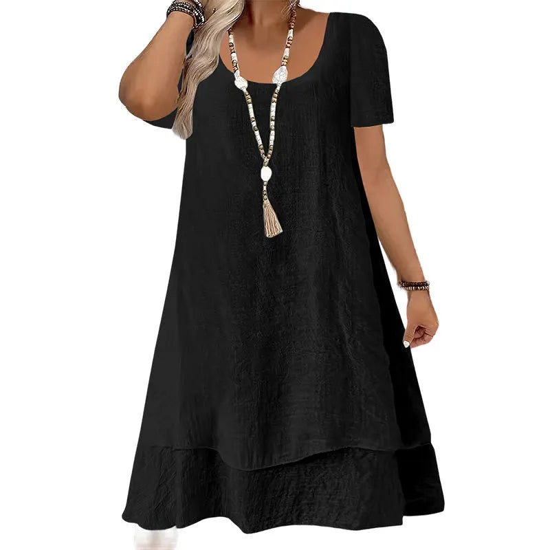 Vestido amplio de mujer con cuello redondo y mangas cortas