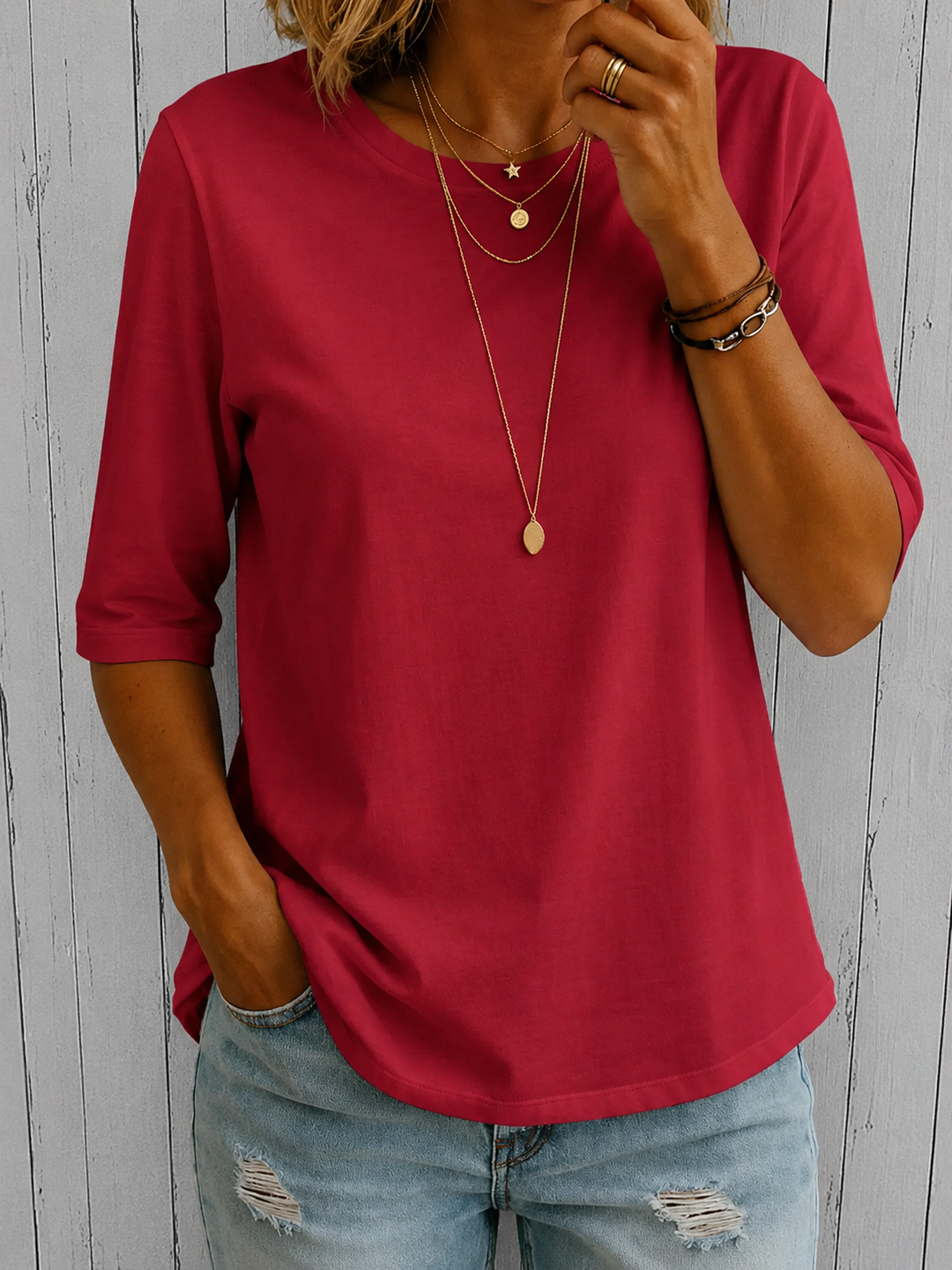Camiseta casual de mujer con cuello redondo y mangas tres cuartos