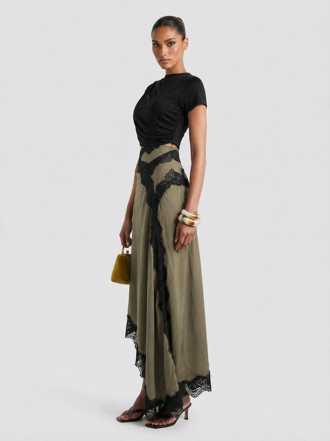 Conjunto mujer top asimétrico falda maxi encaje elegante