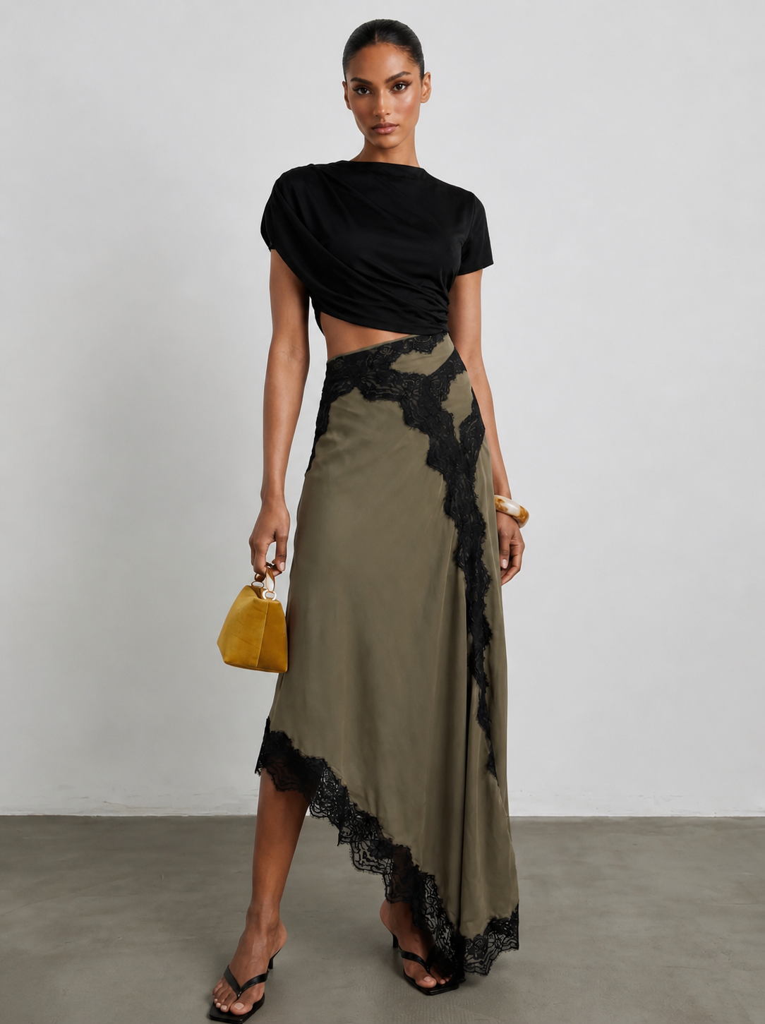 Conjunto mujer top asimétrico falda maxi encaje elegante