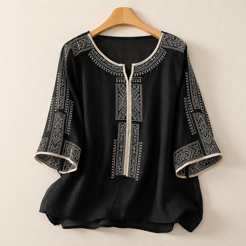 Blusa bordada de mujer con mangas tres cuartos y corte holgado