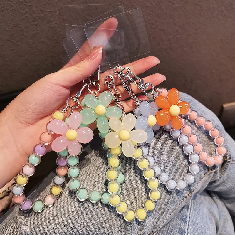 Correa muñequera para móvil hecha a mano con cuentas de colores y flor decorativa, regalo perfecto para mujer
