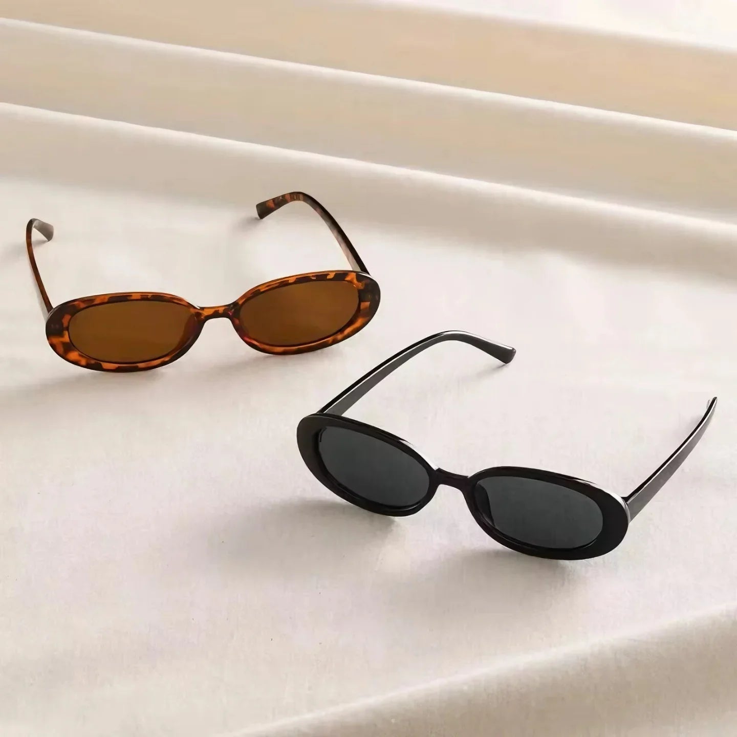 Gafas de sol retro ovaladas mujer – lentes negras UV400 estilo vintage