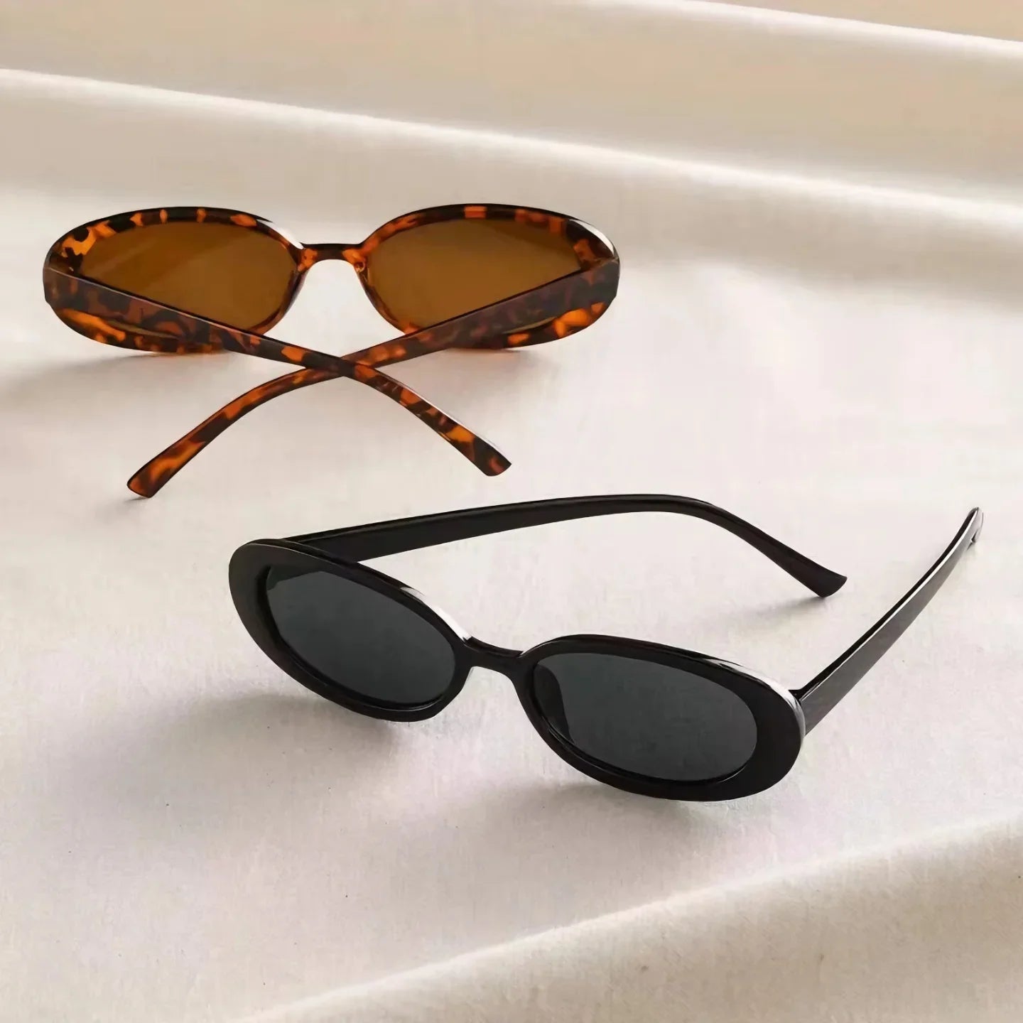 Gafas de sol retro ovaladas mujer – lentes negras UV400 estilo vintage