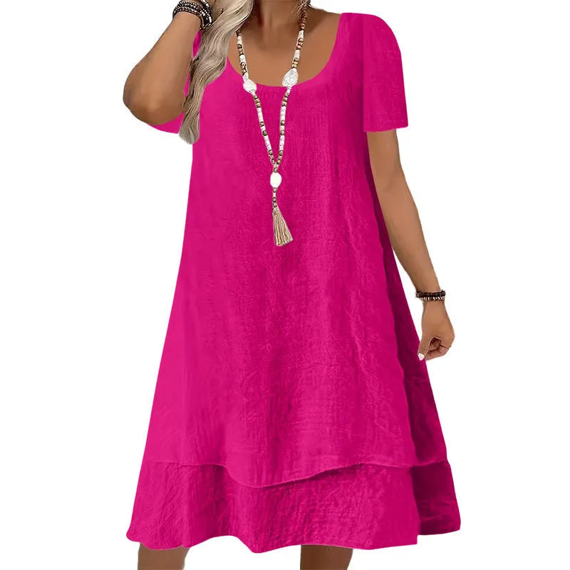 Vestido amplio de mujer con cuello redondo y mangas cortas