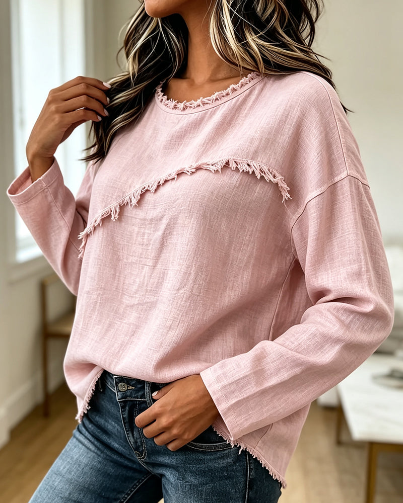 Blusa de mujer con flecos y diseño asimétrico