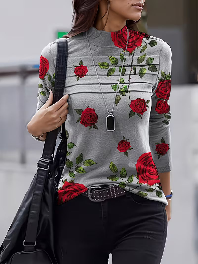 Blusa de mujer con estampado floral, cuello alto y mangas tres cuartos