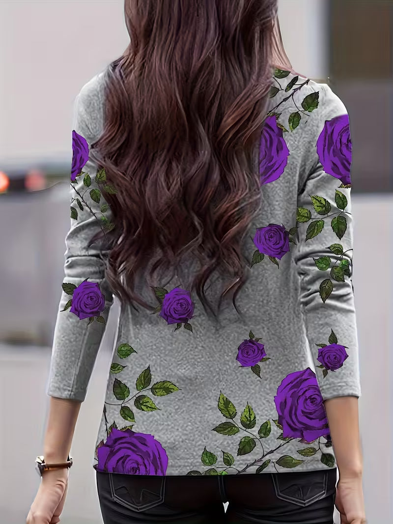 Blusa de mujer con estampado floral, cuello alto y mangas tres cuartos
