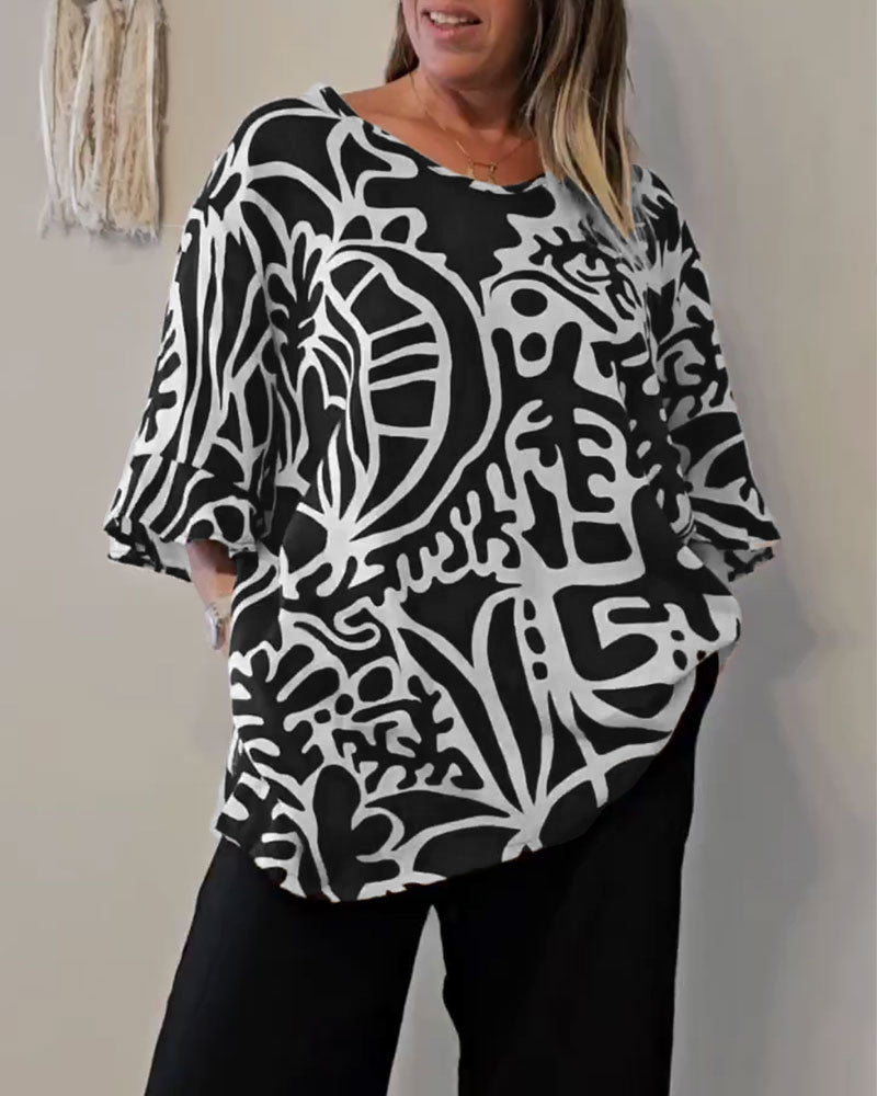 Blusa amplia mujer con estampado abstracto y mangas fluidas
