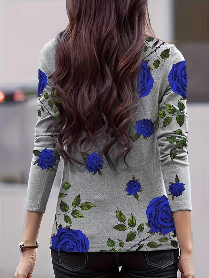 Blusa de mujer con estampado floral, cuello alto y mangas tres cuartos