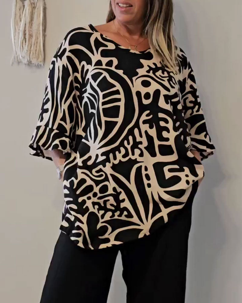 Blusa amplia mujer con estampado abstracto y mangas fluidas
