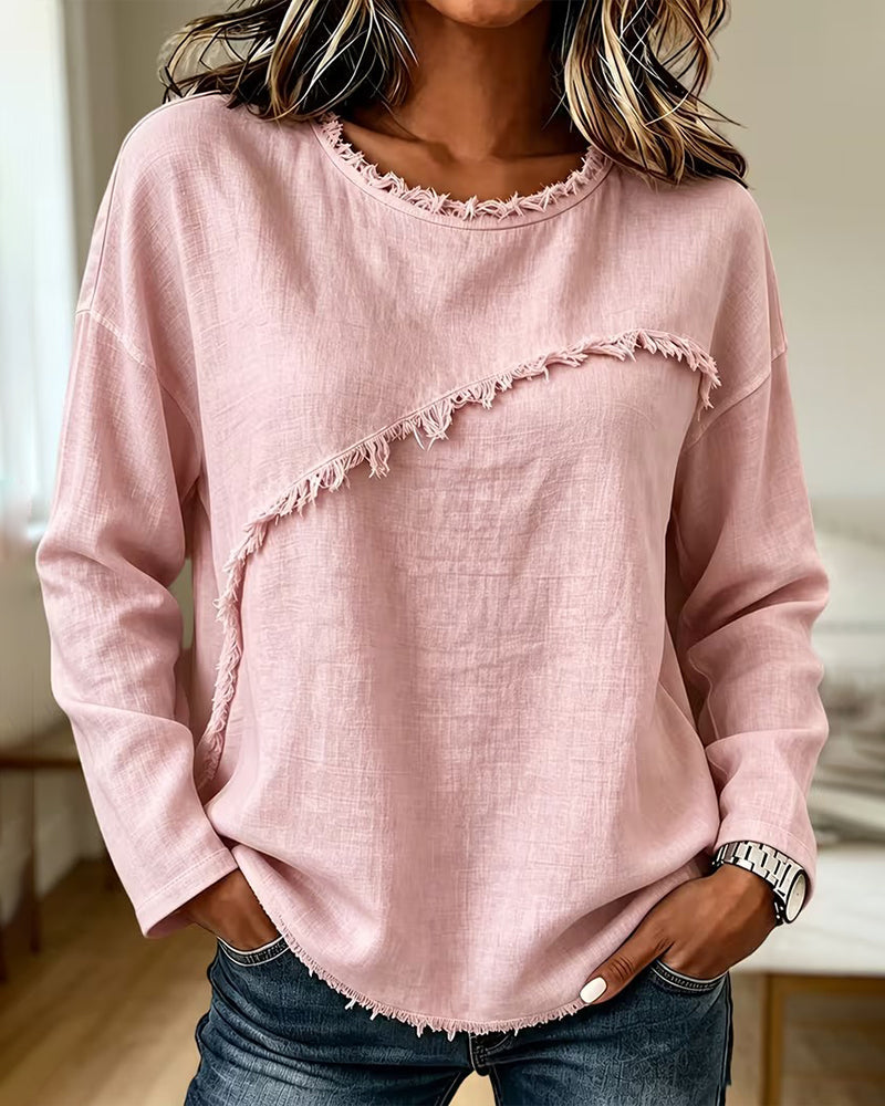 Blusa de mujer con flecos y diseño asimétrico