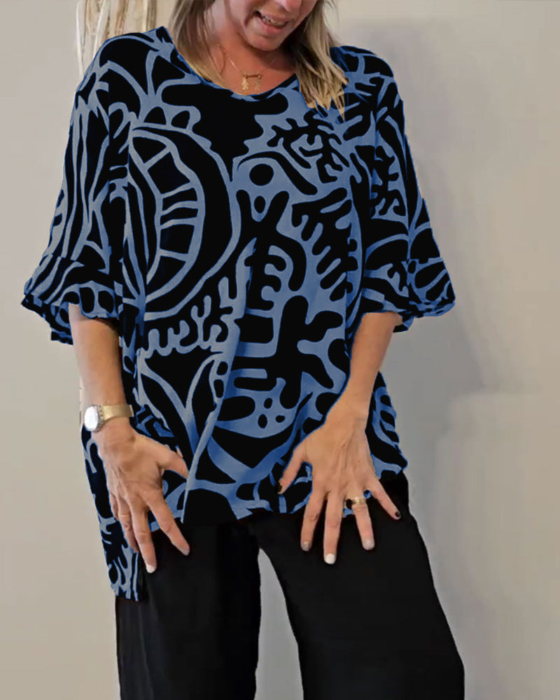 Blusa amplia mujer con estampado abstracto y mangas fluidas