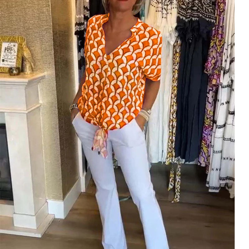 Blusa estampada mujer con cuello en V y mangas cortas