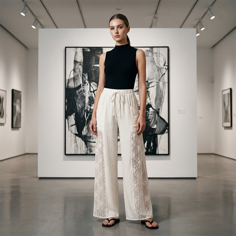 Pantalón mujer fluido con encaje floral y cordón ajustable