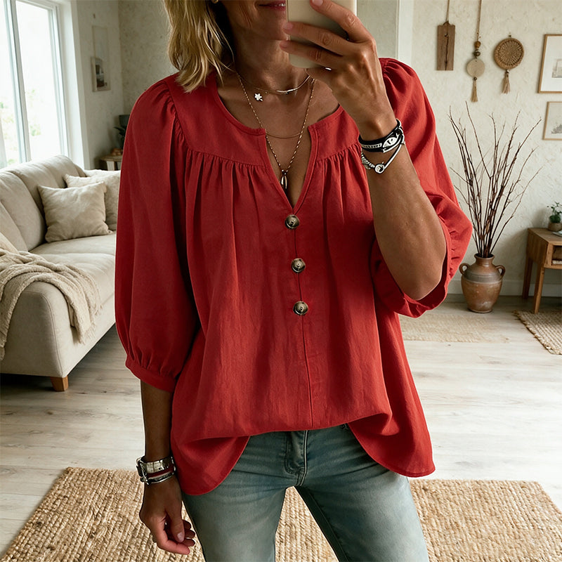 Blusa de mujer con escote en V, botones y mangas tres cuartos